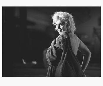Marilyn Monroe in between set-ups at the pool at 20th Century Fox on May 23, 1962, on the movie set of “Something’s Got to Give.”  The set was a replica of director George Cukor’s home.