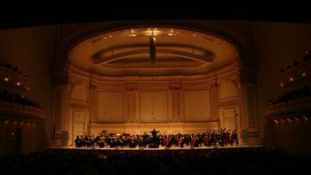The Albany Symphony Orchestra takes the stage at Carnegie Hall to perform a program of American spirituals.