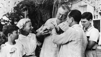 Jeffrey Lyons and his brothers with Ernest and Mary Hemingway and Leonard Lyons at Finca Vigia, San Francisco de Paola, Cuba, December 1952.