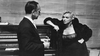 Leonard Lyons with Marilyn Monroe, circa 1960.