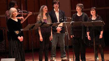 Mountain Goats' John Darnielle with the vocal quartet Anonymous 4 as part of the Ecstatic Music Festival at the Merkin Concert Hall.