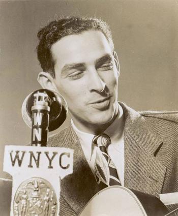 Oscar Brand posing for the press