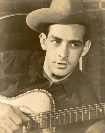 Oscar Brand with his guitar