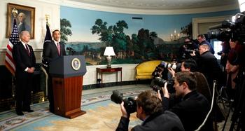 VP Joseph Biden looks on as President Barack Obama makes a statement about Haiti at the White House on Jan. 13, 2010.