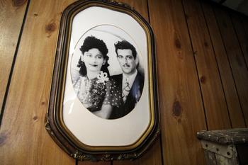 A photograph of Jerry Ragusa's parents hangs in Grande Monuments.
