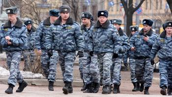 A group of Russian police patrols outside Moscow's Lubyanka Metro station