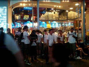 Sneakerheads gather outside of Champs in Times Square.