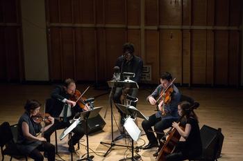 Saul Williams and Mivos Quartet perform at the Ecstatic Music Festival on February 26th, 2014