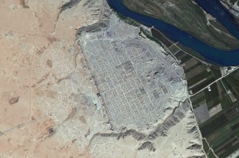 This DigitalGlobe satellite image documents the scale of destruction that looters continue to inflict on archaeological heritage sites during the ongoing conflict in Syria.