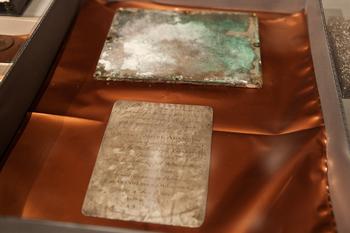 A silver plaque inscribed by Paul Revere, found in a 1795 time capsule, is displayed at the Museum of Fine Arts on January 6, 2015, in Boston, Massachusetts.