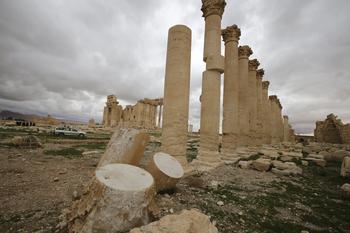 A picture taken on March 14, 2014 shows columns in the courtyard of the temple of Baal at the ancient city of Palmyra damaged by artillery shelling.