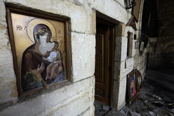 A picture taken on May 14, 2014 shows damages in the monastery of Saint Takla in the ancient Christian town of Maalula, 56 kilometers northeast of the Syrian capital Damascus.