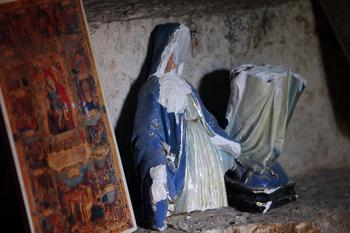 A picture taken on May 14, 2014 shows a damaged statue of the Virgin Mary in the monastery of Saint Takla in the ancient Christian town of Maalula.