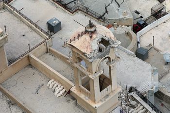 A damaged church steeple is seen in the ancient Christian town of Maalula, 56 kilometers northeast of the Syrian capital Damascus, on May 14, 2014. 