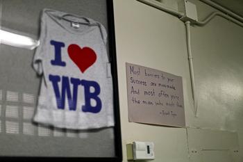 A shirt and sign hang at West Brooklyn Community High School.