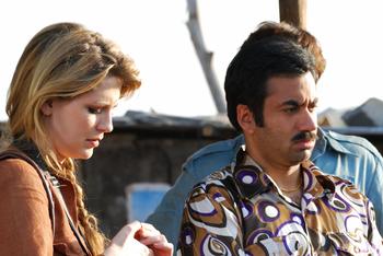 Mischa Barton and Kal Penn on the set.