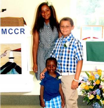 The children of David Michener and Bill Ives. Clockwise: Anna, Jackson, and Michael
