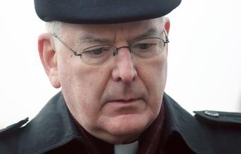 Archbishop John Nienstedt joins abortion opponents in an April 2014 prayer vigil outside a St. Paul Planned Parenthood office. 