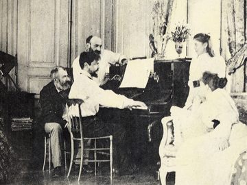 Debussy at the piano in front of the composer Ernest Chausson, 1893