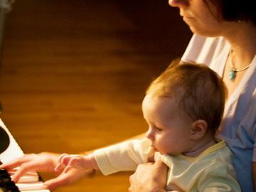 piano lesson: mother and child