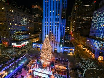 A view from overhead of the 2020 Rockefeller Christmas tree all lit up.