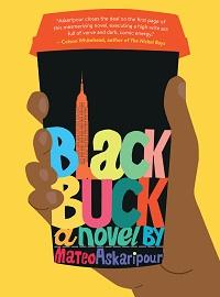 A hand holding a coffee cup with the book title and image of the Empire State Building