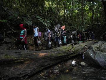 Migrants continue on their trek north, near Acandi, Colombia.