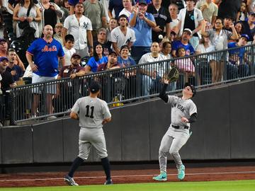 Alex Verdugo #24 of the New York Yankees makes a catch during the game between the New York Yankees and the New York Mets at Citi Field on Wednesday, June 26, 2024 in New York, New York.