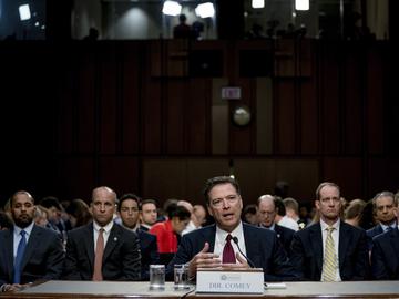 Former FBI Director James Comey speaks during a Senate Intelligence Committee hearing on Capitol Hill, Thursday, June 8, 2017, in Washington. 