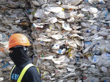 A container is filled with plastic waste from Australia, in Port Klang, Malaysia, Tuesday, May 28, 2019. 