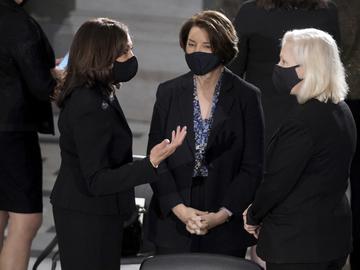 emocratic vice presidential candidate Sen. Kamala Harris, D-Calif., left, talks with Sen. Amy Klobuchar, D-Minn., and Sen. Kirsten Gillibrand, D-N.Y., right.