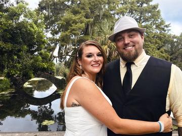 This image released bu Jordan Tyler shows Tyler, right, with his wife Brittany in New Orleans on July 18, 2020. The couple signed up for Match.com, started texting March 18 and were wed by July.