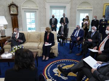 In this Feb. 3, 2021, file photo President Joe Biden and Vice President Kamala Harris meet with Senate Majority Leader Sen. Chuck Schumer of N.Y., left, and other Democratic lawmakers to discuss...