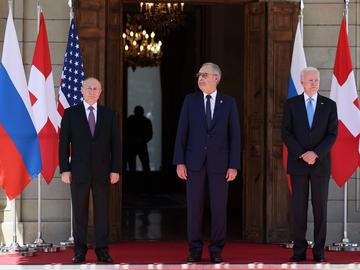 Russian President Vladimir Putin, Swiss President Guy Parmelin, U.S President Joe Biden pose for media in Geneva, Switzerland, Wednesday, June 16, 2021. 