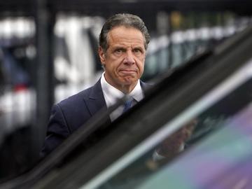 New York Gov. Andrew Cuomo prepares to board a helicopter after announcing his resignation, Tuesday, Aug. 10, 2021, in New York. 