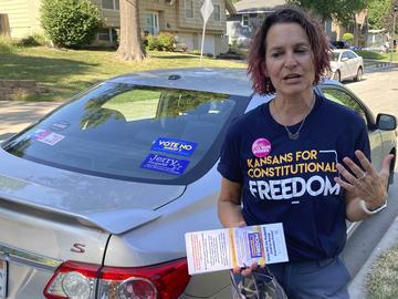 Anne Melia discusses her opposition to a proposed amendment to the Kansas Constitution that would allow legislators to further restrict or ban abortion on July 14, 2022.