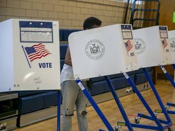 People vote at the Anning S. Prall Intermediate School in the Staten Island borough of New York City on Tuesday, June 28, 2022.