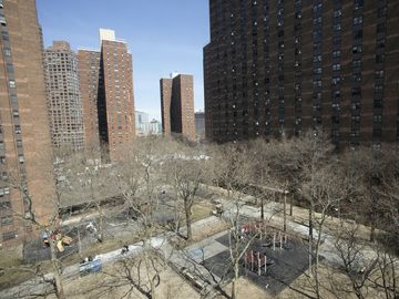 The New York City Housing Authority's John Haynes Holmes Towers are shown, Thursday, April 4, 2019, in New York