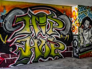 A mural at the birthplace of Hip Hop at Bronx's Sedgwick Houses, features an image of the genre's creator DJ Kool Herc, Wednesday July 26, 2023, in New York.