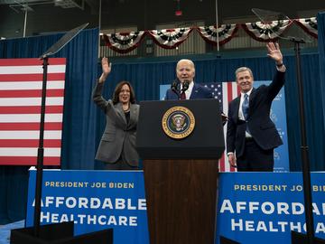 From left, Vice President Kamala Harris, President Joe Biden and Democratic North Carolina Governor Roy Cooper wave to and address the audience during campaign event in Raleigh, N.C., Tuesday, March 2