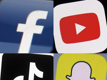 This combo photo shows the logos of Facebook, top left; YouTube, top right; TikTok, bottom left; and Snapchat, bottom right, on mobile devices. 