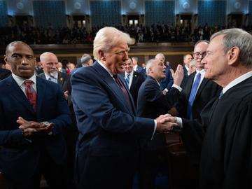 President Donald Trump (L) greets Chief Justice of the United States John G. Roberts, Jr as he arrives to deliver an address to a joint session of Congress at the U.S. Capitol on March 04, 2025 in Was