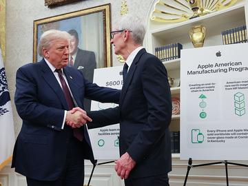 U.S. President Donald Trump (L) shakes hands with Apple CEO Tim Cook during an event in the Oval Office of the White House on August 6, 2025 in Washington, DC. 