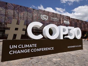 The COP30 logo is seen in front of the central building ahead of the COP30 Brazil Amazonia 2025 on November 3, 2025 in Belem, Brazil.