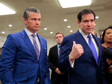 U.S. Secretary of War Pete Hegseth (L) and U.S. Secretary of State Marco Rubio speak to the media following a closed door briefing with senators on the U.S. the capture of Venezuela’s Nicolas Maduro a