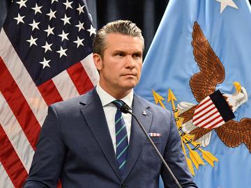 US Secretary of Defense Pete Hegseth looks on during a joint press conference with Admiral Charles Bradford 'Brad' Cooper II, Commander of US Central Command, at US Central Command (CENTCOM) headquart