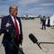 President Donald Trump talks with reporters after arriving at Andrews Air Force Base, Thursday, Sept. 26, 2019.