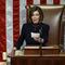 House Speaker Nancy Pelosi of Calif., readies to strike the gavel as she announces the passage of article II of impeachment against President Donald Trump.