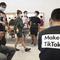 In this July 17, 2020, file photo, a visitor to an Apple store wears a t-shirt promoting Tik Tok in Beijing.