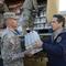 Gov. Andrew Cuomo along with Congresssman Gregory W. Meeks unload National Guard trucks of supplies for Hurricane Sandy Relief.
